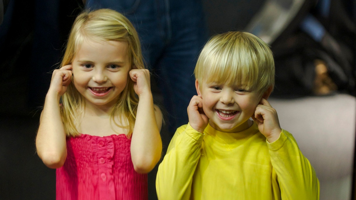 Children laughing at bendy mirrors, Camera Obscura & World of Illusions, Edinburgh.