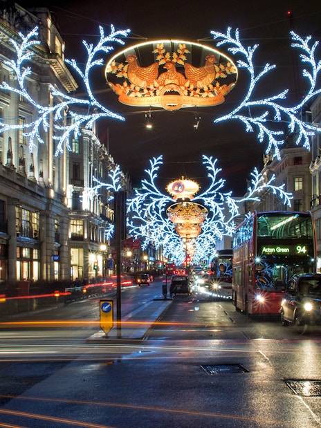 London street adorned with festive Christmas lights during the London Christmas Lights Tour.