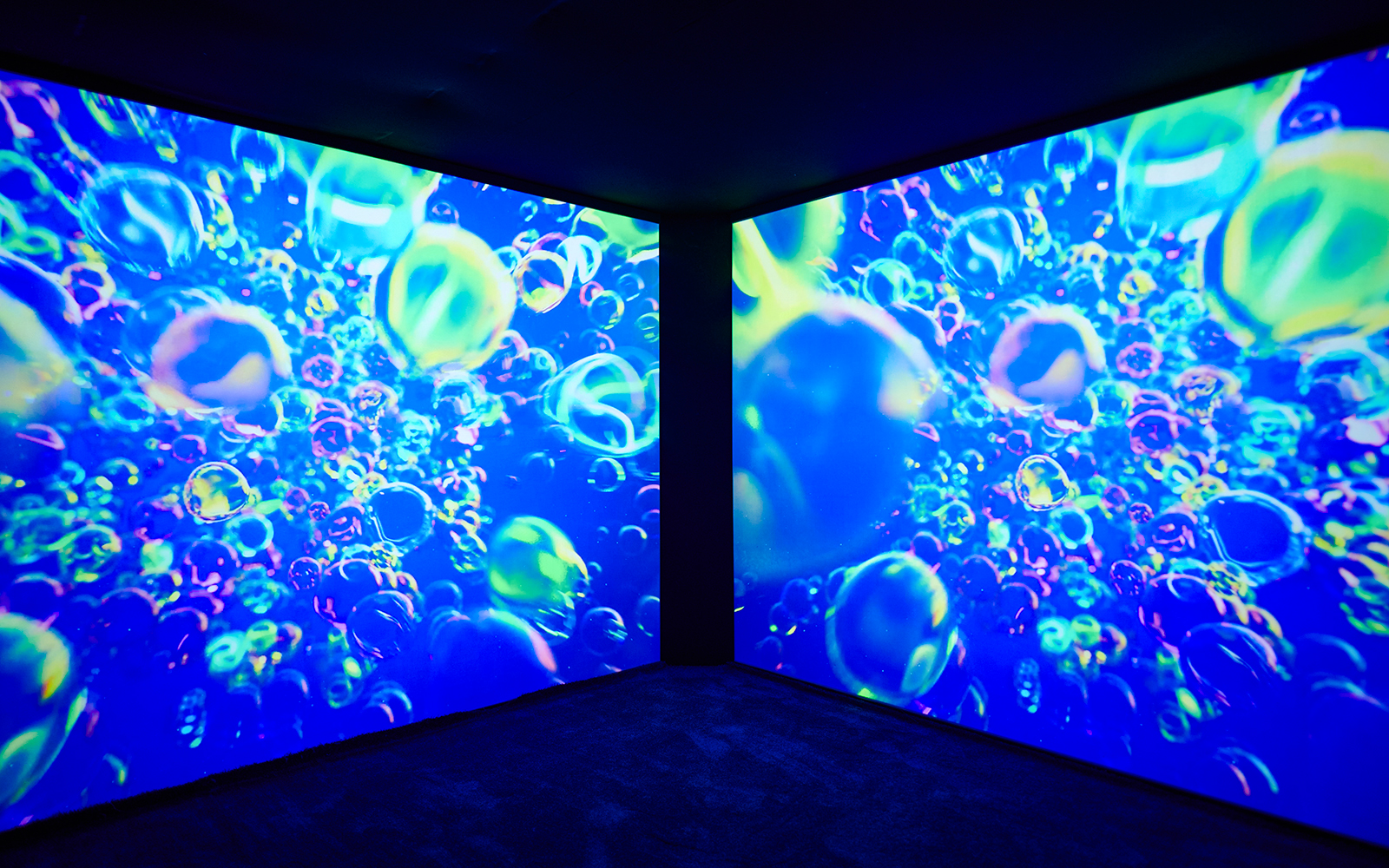 Colorful digital art installation at Cosmic Oasis, Dopamine Land.