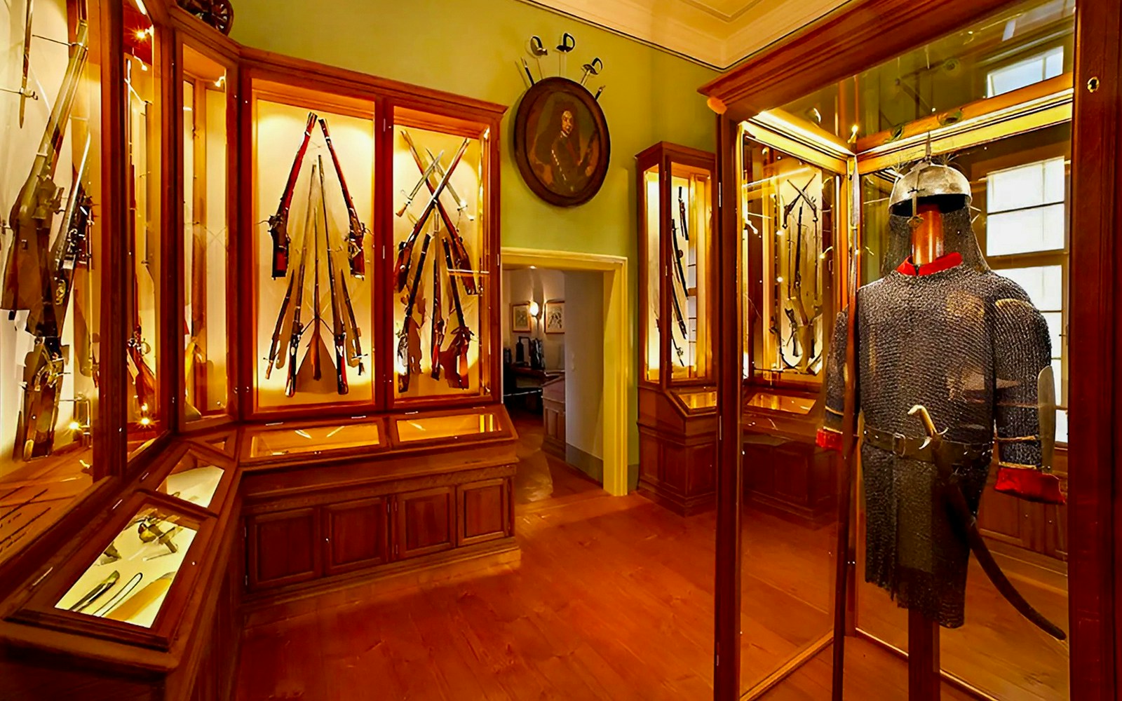 Cesky Krumlov Castle Museum interior with historical artifacts and ornate architecture.