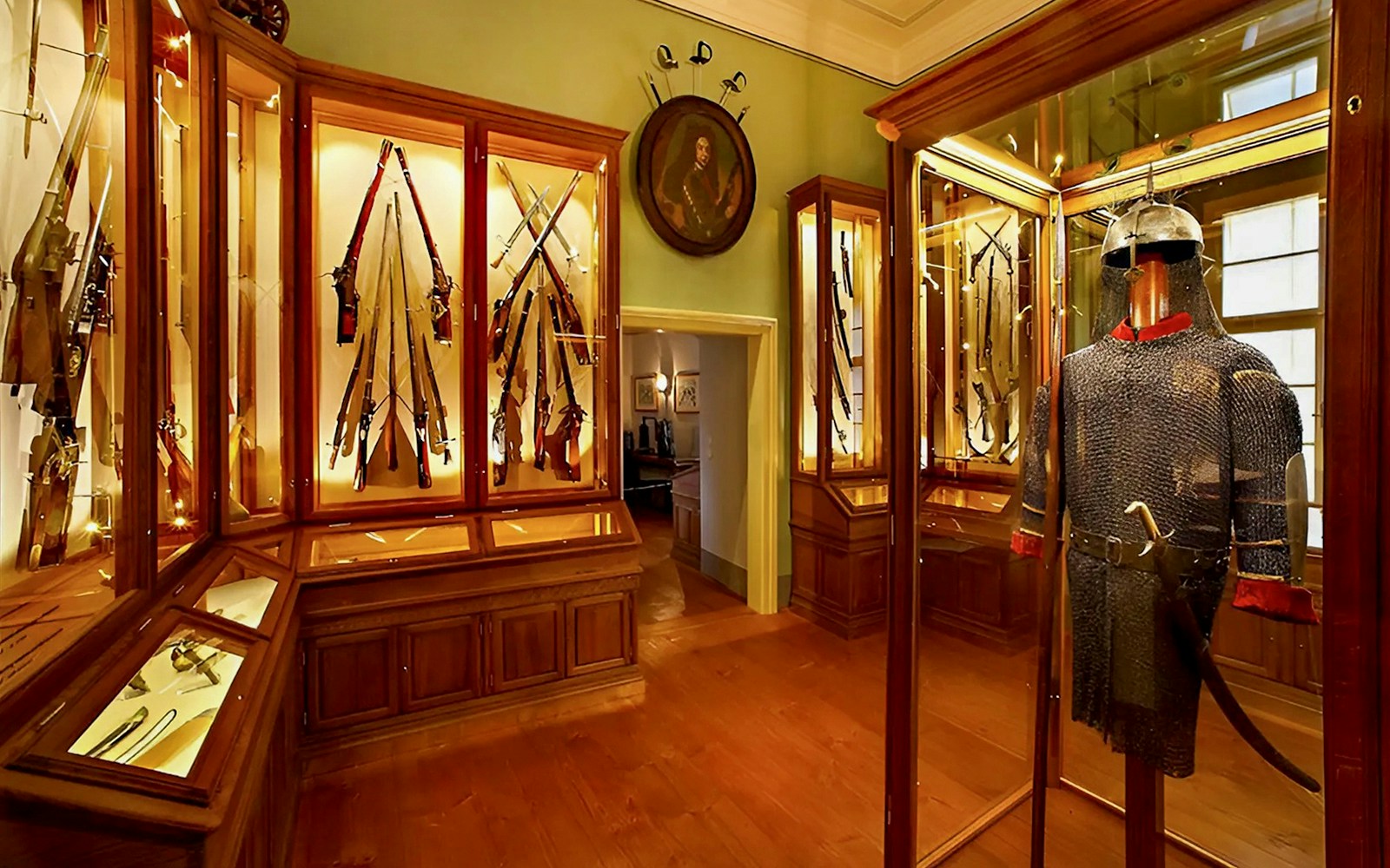 Cesky Krumlov Castle Museum interior with historical artifacts and ornate architecture.