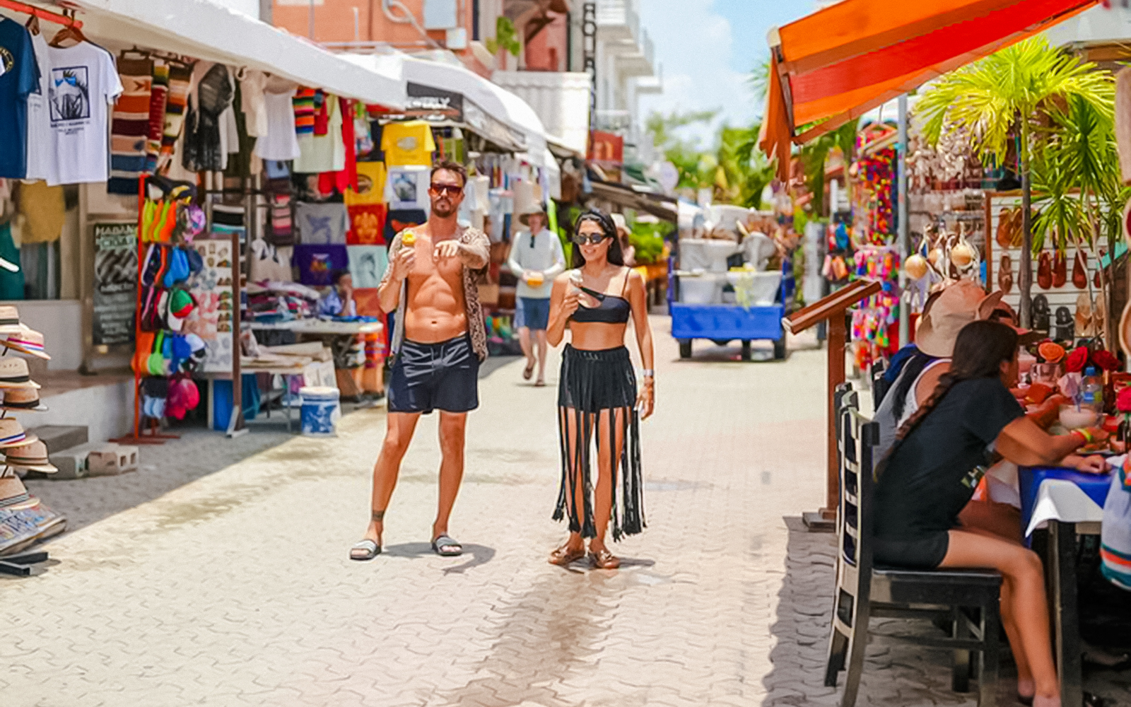Pedestrian street with souvenir shops and restaurants in Isla Mujeres, Mexico.