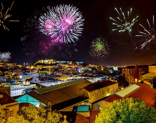 Lisbon at night with fireworks - View from Miradouro Bairro Alto