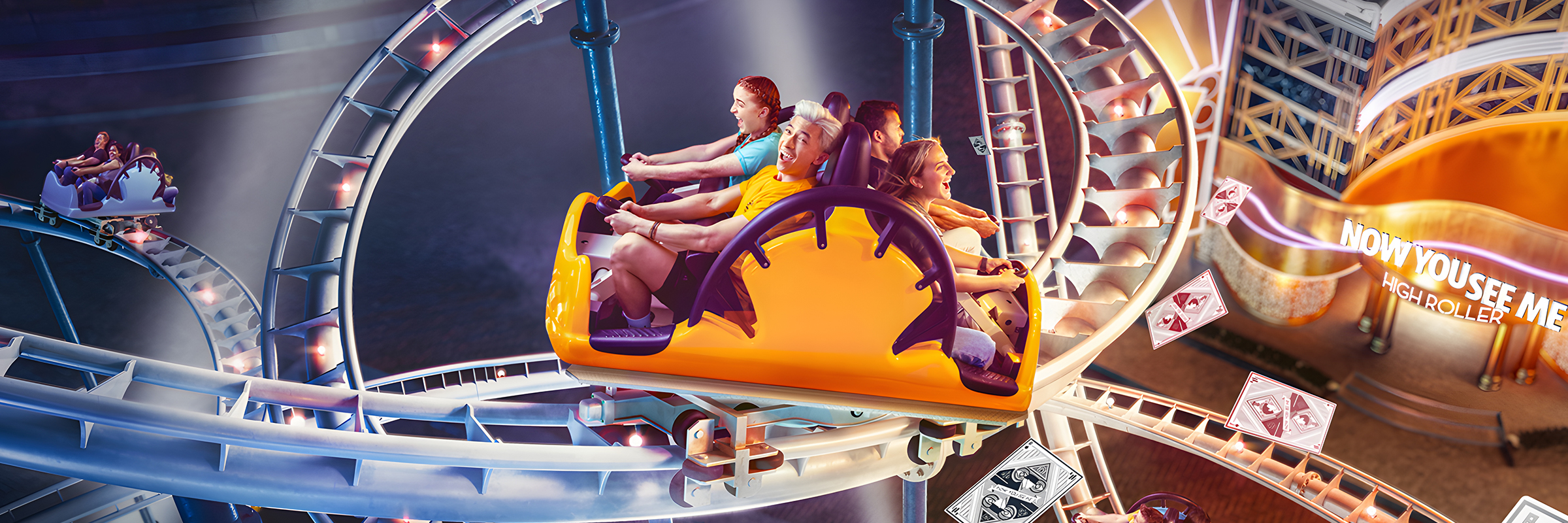 MotionGate Dubai rollercoaster with vibrant loops and twists in a theme park setting.