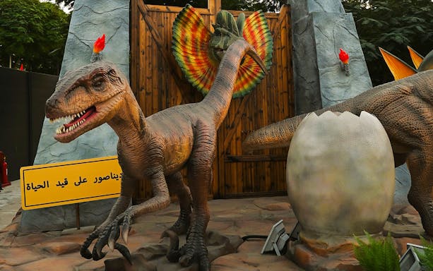 Dinosaur display with egg at Dino Live, Dubai Garden Glow.