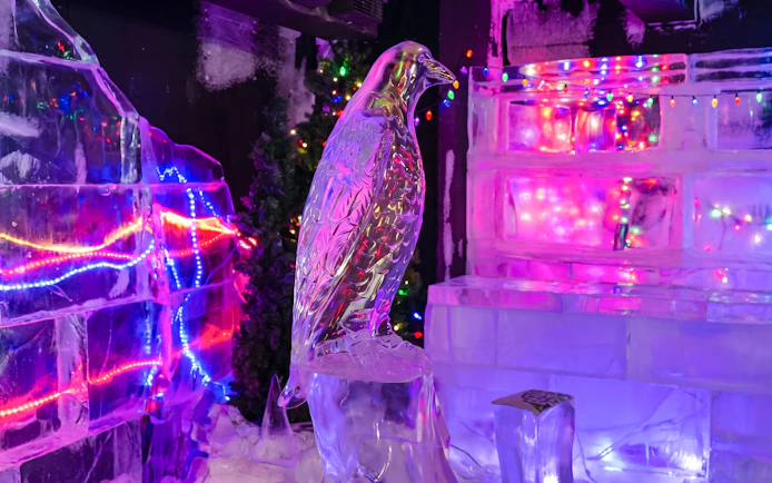 Ice sculpture of a bird with colorful lights at Chena Hot Springs, Alaska.