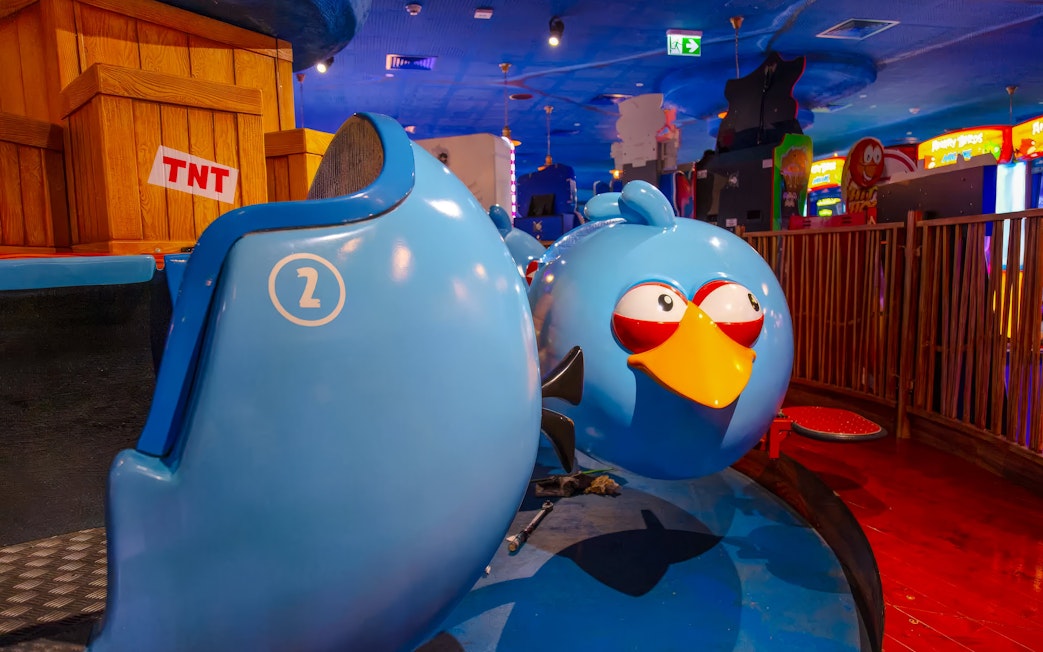 Bouncing blues ride at Angry Birds World Theme Park featuring blue bird-themed seats.