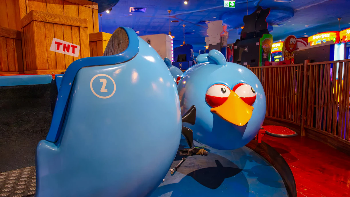 Bouncing blues ride at Angry Birds World Theme Park featuring blue bird-themed seats.