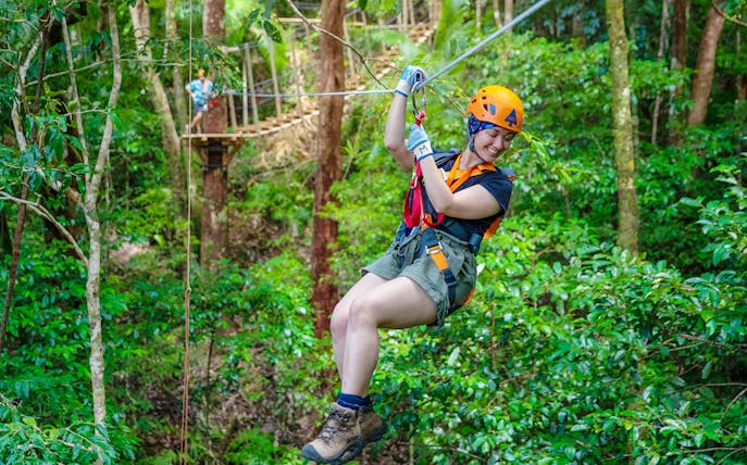 Person ziplining through Daintree Rainforest on Ultimate Daintree Tour, Cape Tribulation.