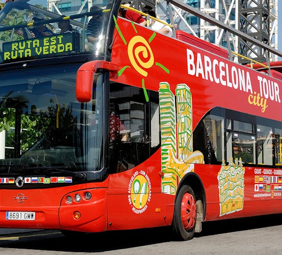 Red double-decker bus for Barcelona city tour with hop-on hop-off tickets.