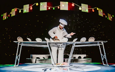 Performer balancing plates at WOW: The Vegas Spectacular show.