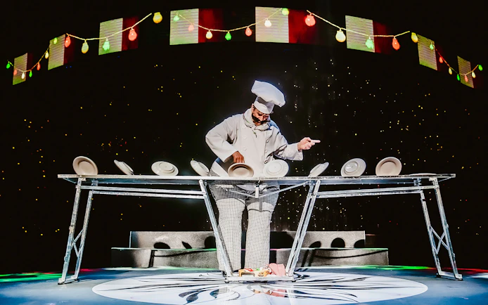 Performer balancing plates at WOW: The Vegas Spectacular show.