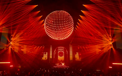 Red laser light show at a performance in Paradise, Ibiza.