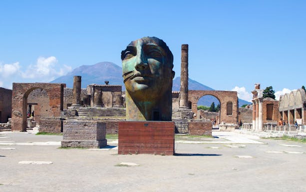 Bronze sculpture "Il Grande Sguardo" at Pompeii archaeological site, Italy.
