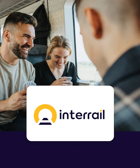 Group playing cards on a Rail Europe train journey.