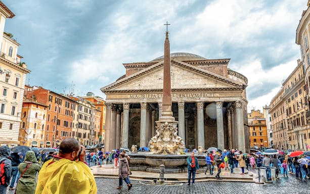 Pantheon in Rome with tourists during a golf cart tour.