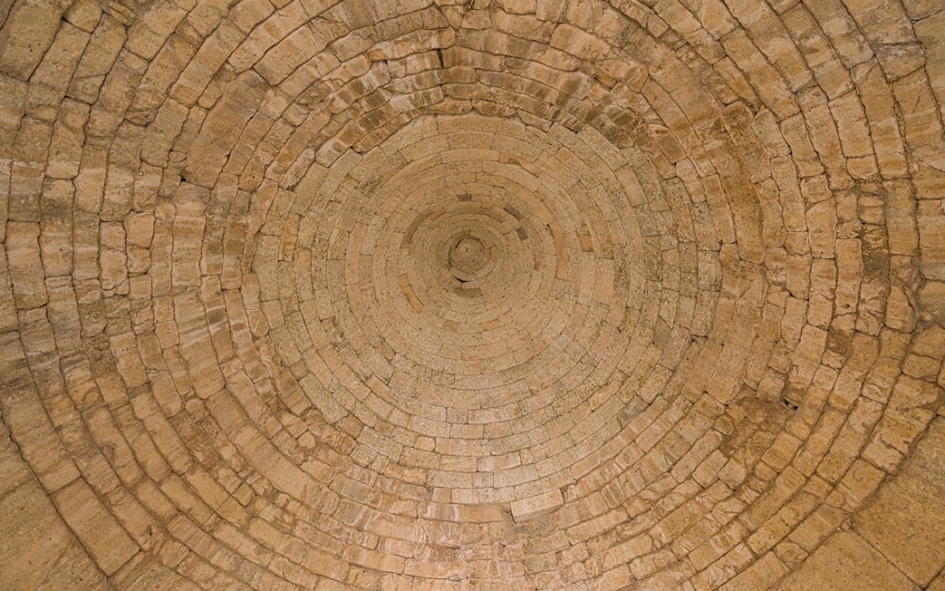 Stone ceiling of the Treasury of Atreus in Mycenae, Greece.