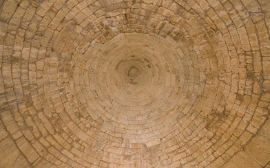 Stone ceiling of the Treasury of Atreus in Mycenae, Greece.