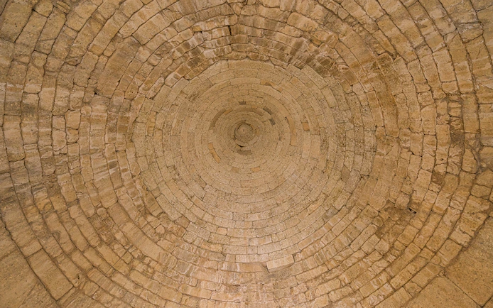 Stone ceiling of the Treasury of Atreus in Mycenae, Greece.