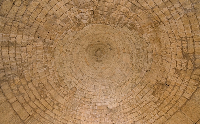 Stone ceiling of the Treasury of Atreus in Mycenae, Greece.