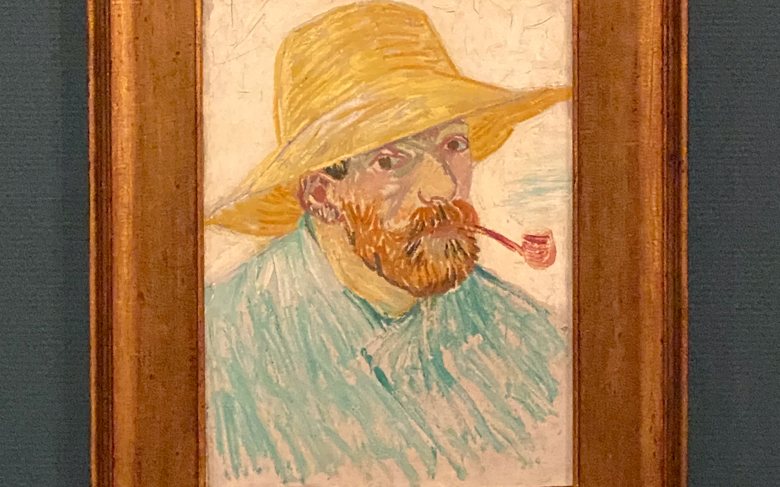 self-portrait with pipe and straw hat at the van gogh museum