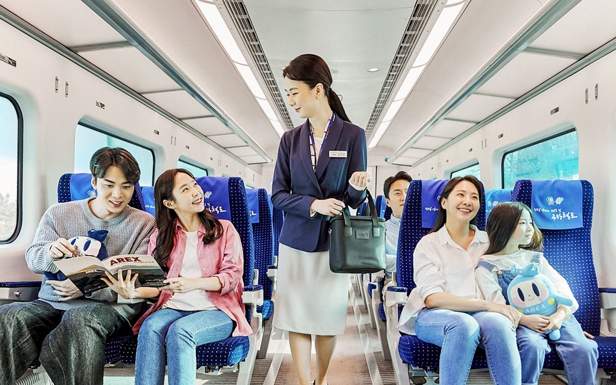 AREX Express Train passengers enjoying free wifi during round trip.