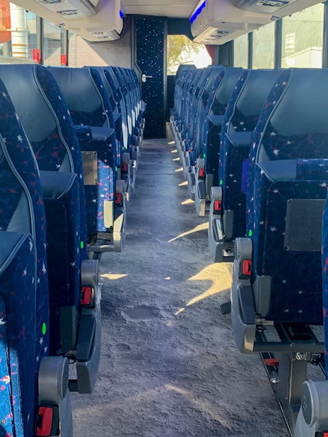 Interior of tour bus for Kennedy Space Center 1 Day Admission with Live Guide Tour.