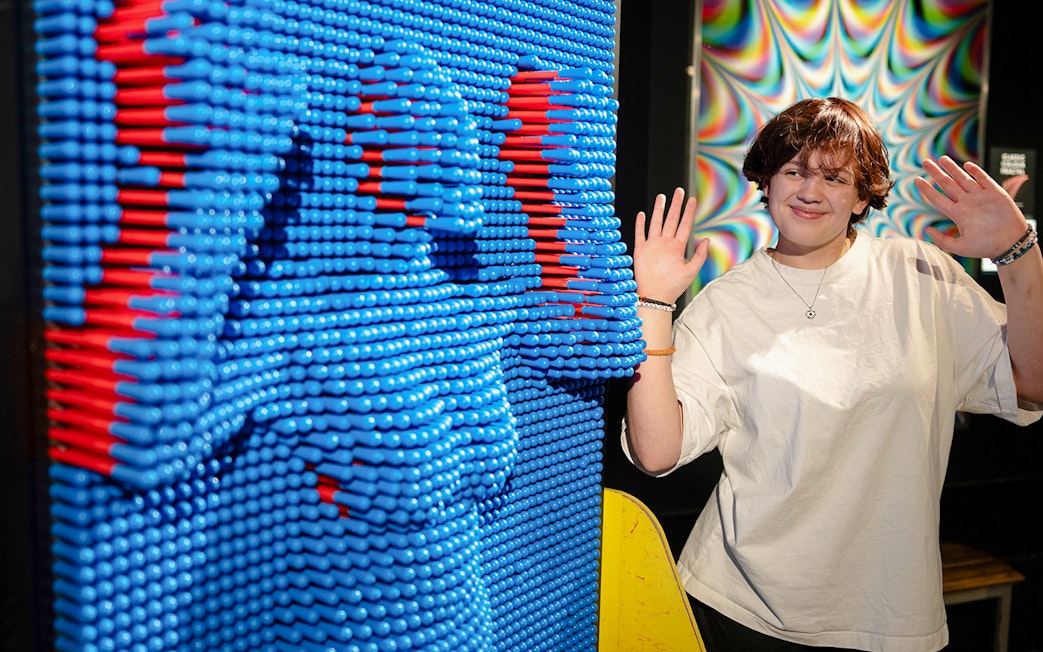 Guests interacting with pinwall at Camera Obscura & World of Illusions, Edinburgh.