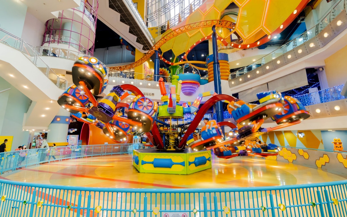 Thrilling ride with tourists at Berjaya Times Square Theme Park, Kuala Lumpur.