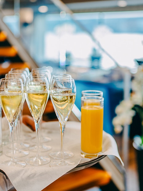 Drinks served on a tray during New Year's Eve dinner cruise.