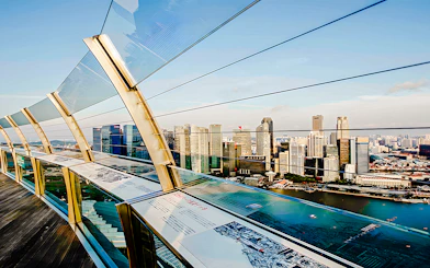 Marina Bay Sands SkyPark Observation Deck overlooking Singapore skyline.