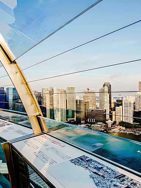Marina Bay Sands SkyPark Observation Deck overlooking Singapore skyline.