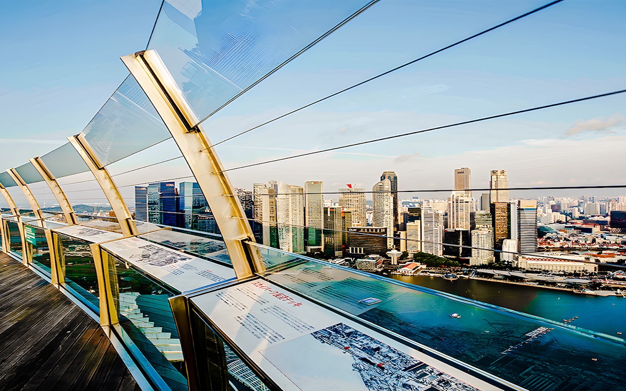 Marina Bay Sands SkyPark Observation Deck overlooking Singapore skyline.
