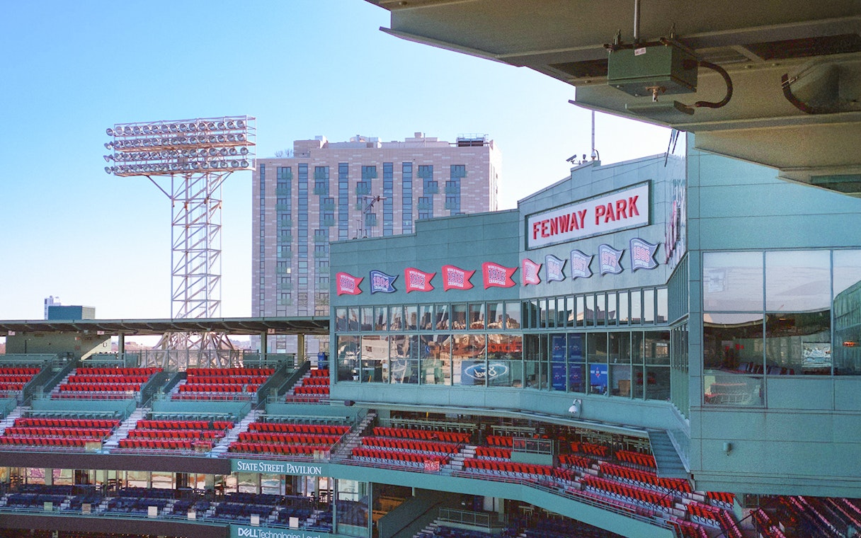 Fenway Park seating area and exterior view in Boston.