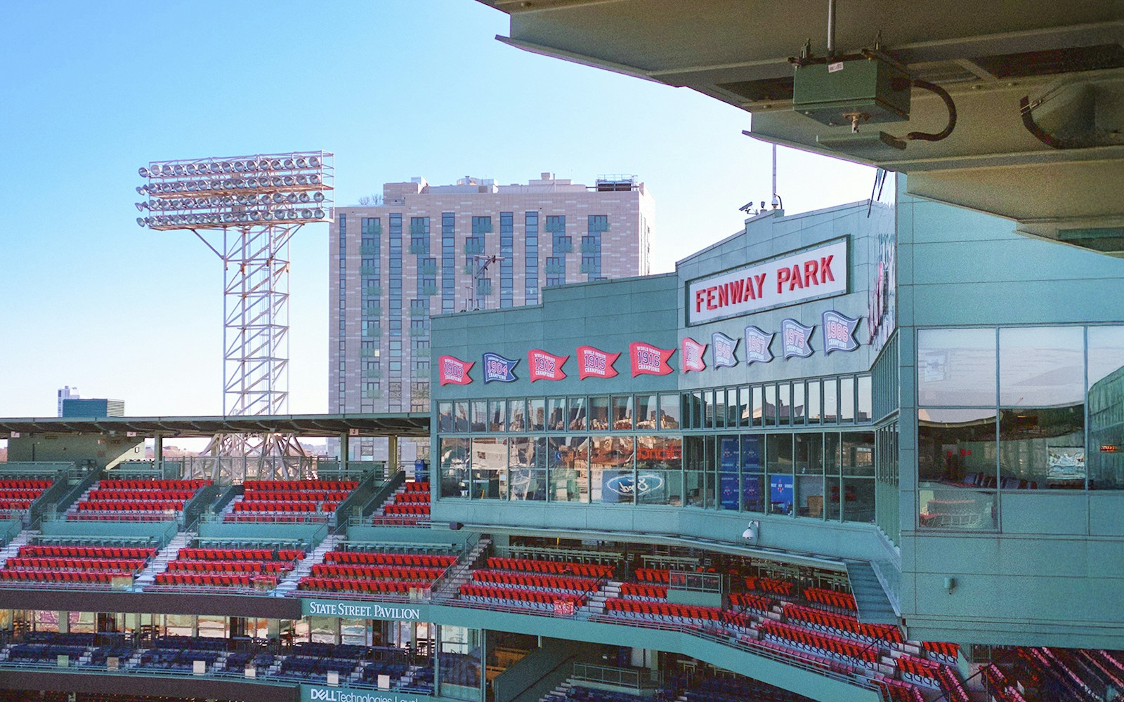 Fenway Park seating area and exterior view in Boston.
