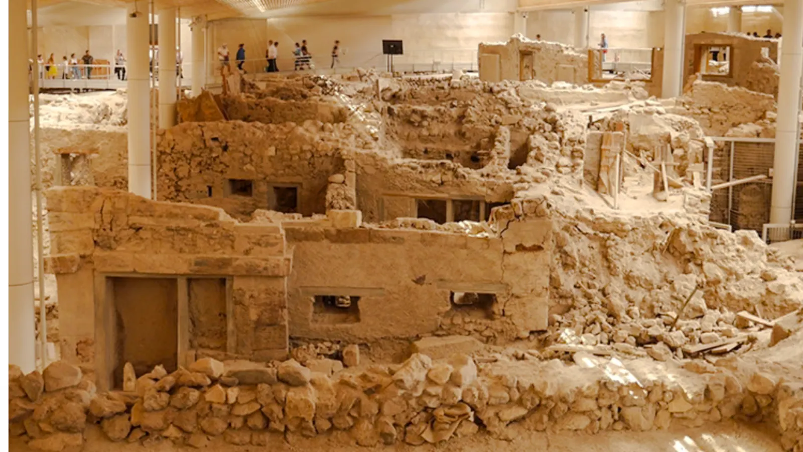 Akrotiri archaeological ruins with ancient structures in Santorini.