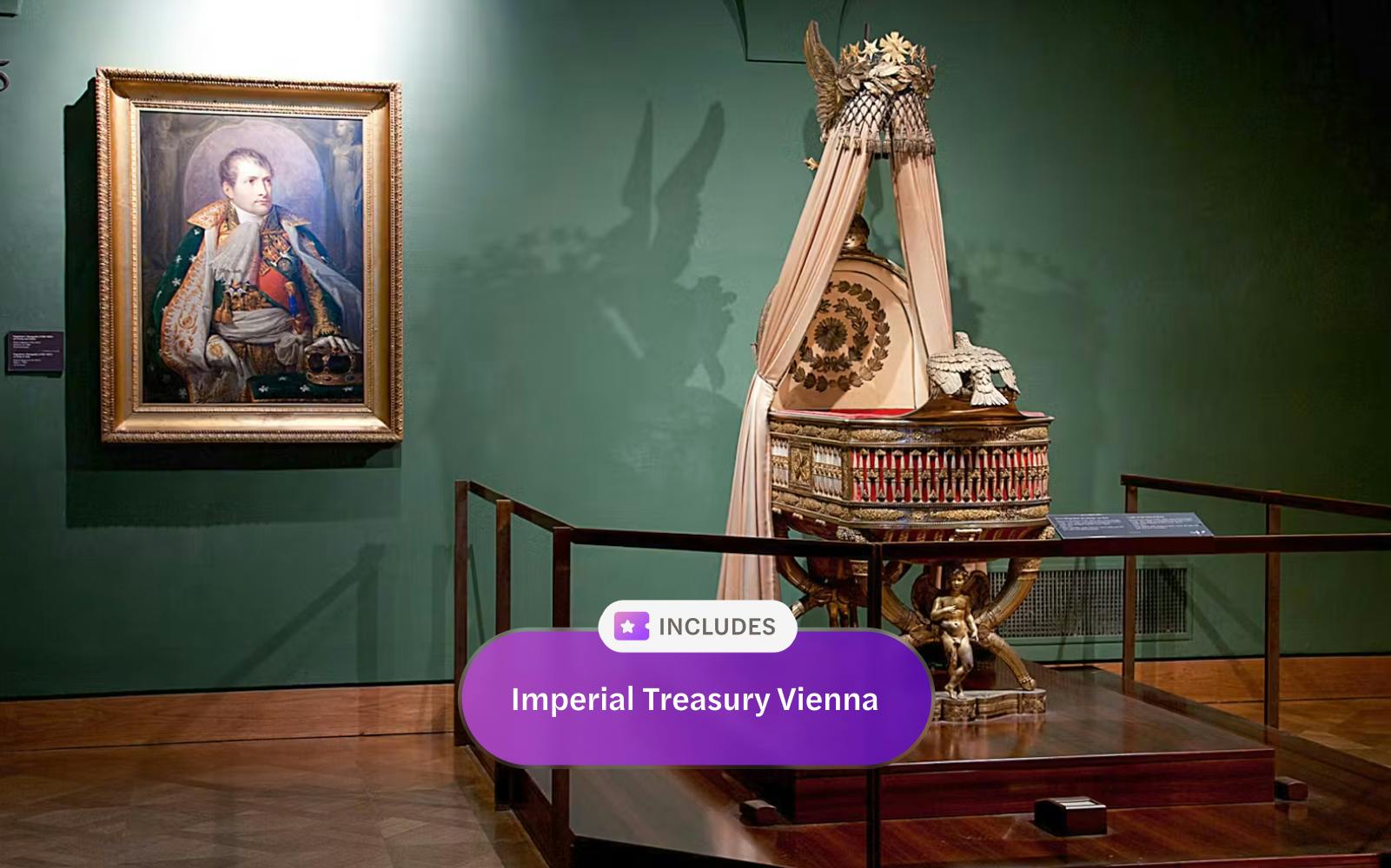 Portrait and imperial cradle display at Imperial Treasury Vienna.