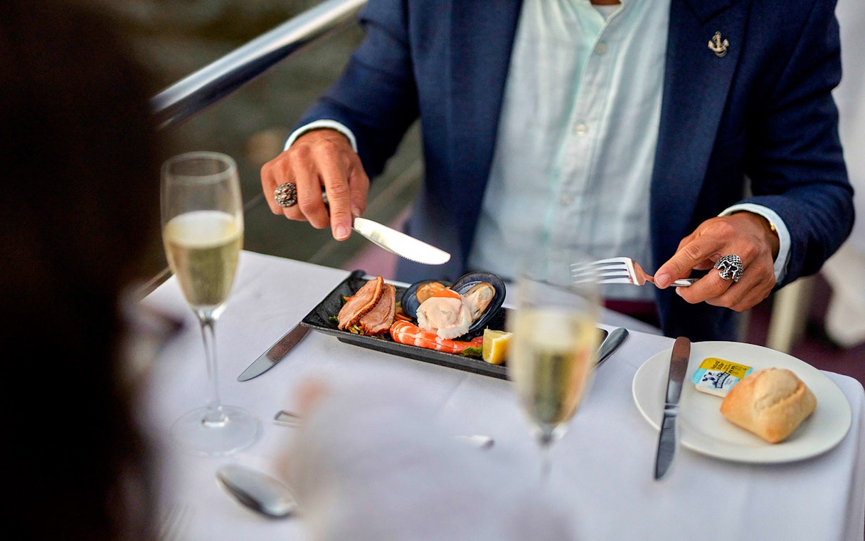 Dinner on Spirit of Melbourne Cruise with seafood platter and champagne on Yarra River.