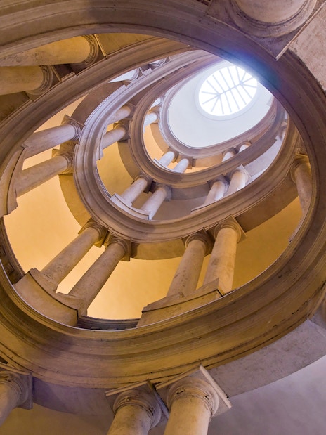 Barberini Palace spiral staircase in Rome, view from below, featured in skip-the-line tour tickets.
