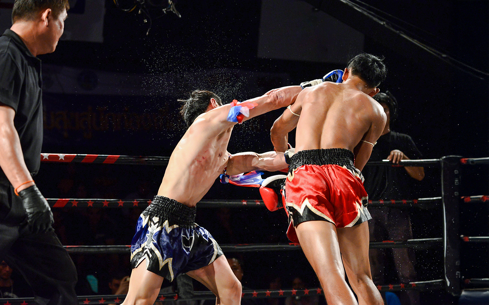 Muay Thai fighters in action at Bangla Boxing Stadium, Phuket.