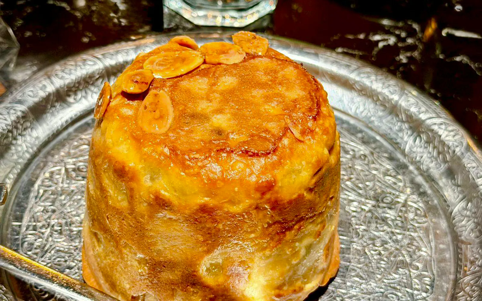 Perde Pilavı served on a decorative plate during Turkish Food Night in Istanbul.