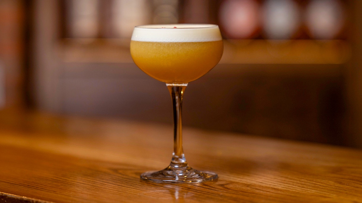 Jameson Distillery cocktail-making class with whiskey bottles and mixing tools in Dublin, Ireland.