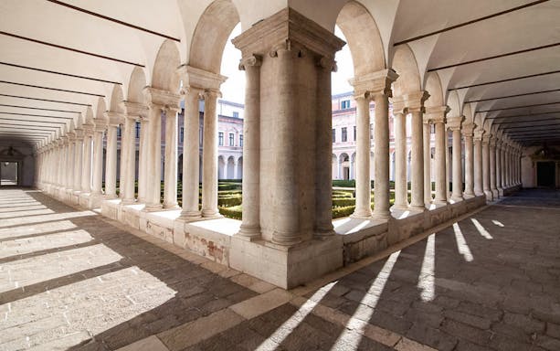 Cloister with columns at Giorgio Cini Foundation, Venice, part of the Borges Labyrinth tour.