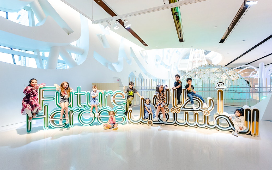 Children playing at the Future Heroes exhibit in the Museum of The Future, Dubai.