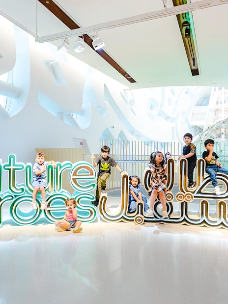 Children playing at the Future Heroes exhibit in the Museum of The Future, Dubai.