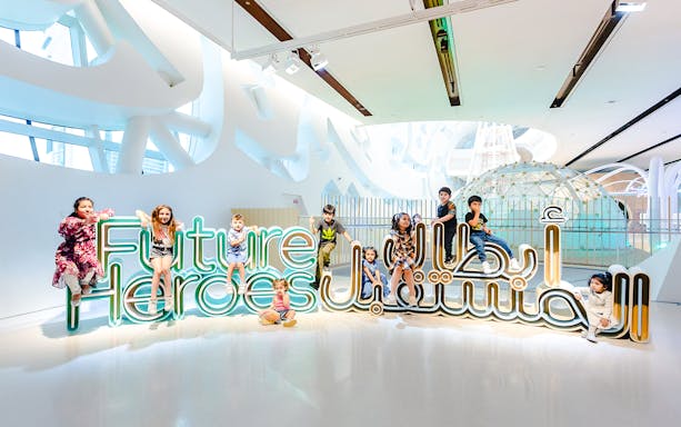 Children playing at the Future Heroes exhibit in the Museum of The Future, Dubai.