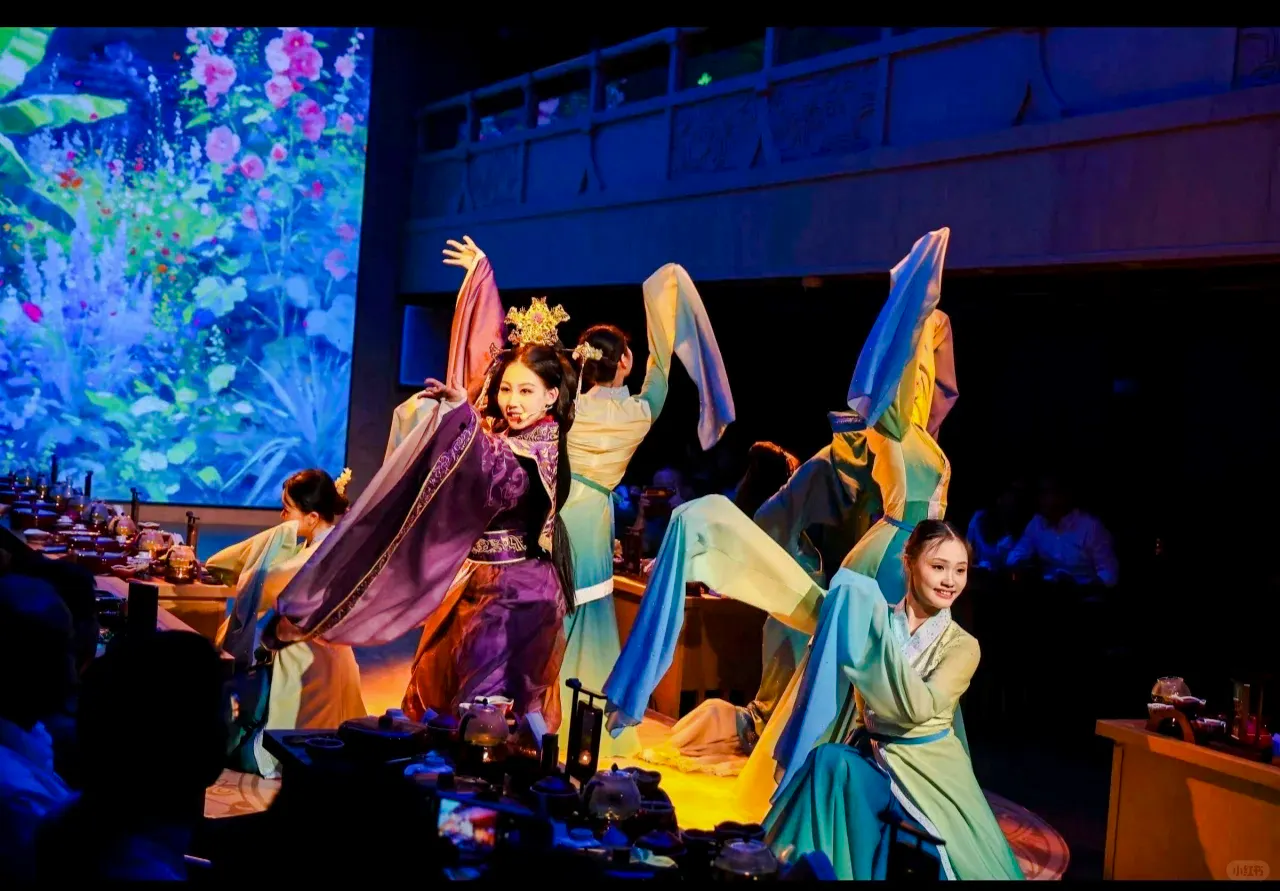 Performers in traditional costumes during a live show on the Pearl River Night Cruise, Guangzhou.