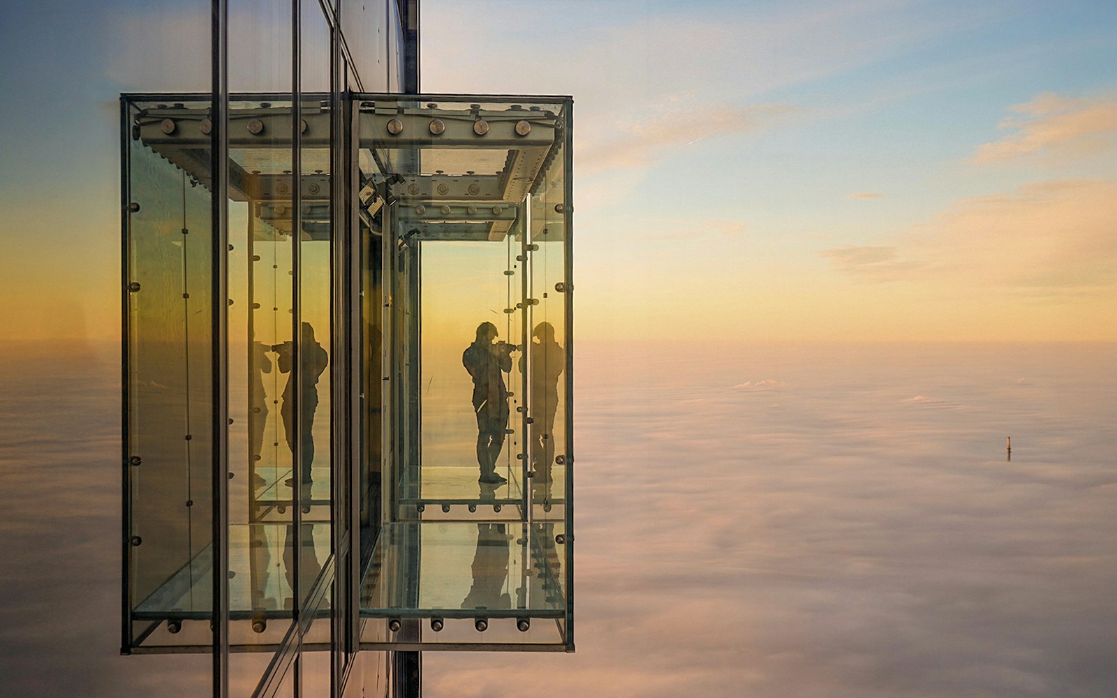 View from Willis Tower Skydeck in Chicago at sunset.