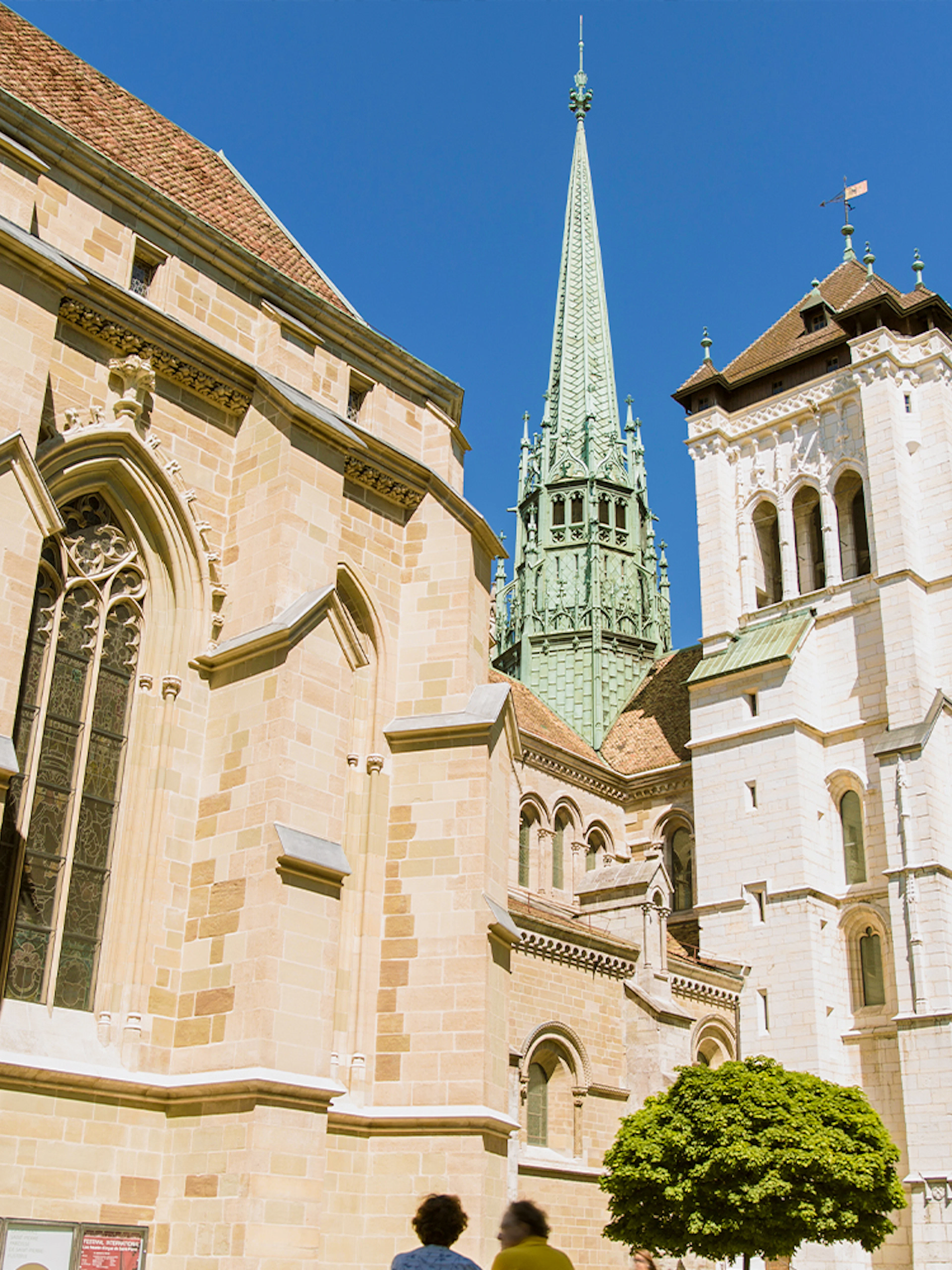 St. Pierre Cathedral in Geneva with its iconic spire on a sunny day.
