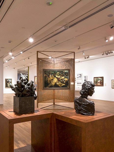 Art sculptures and paintings inside National Gallery Singapore exhibit.